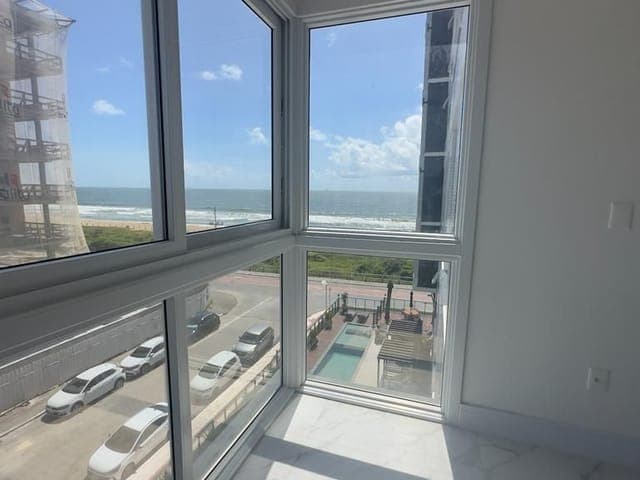 Foto 1 de Apartamento com 2 suítes + 1 dormitório à venda, 109.75m² - Praia Brava - Itajaí/SC